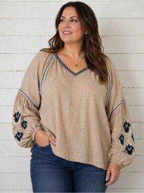 Neiman Marcus tan linen blouse with black and white embroidery. Womens size XL.
